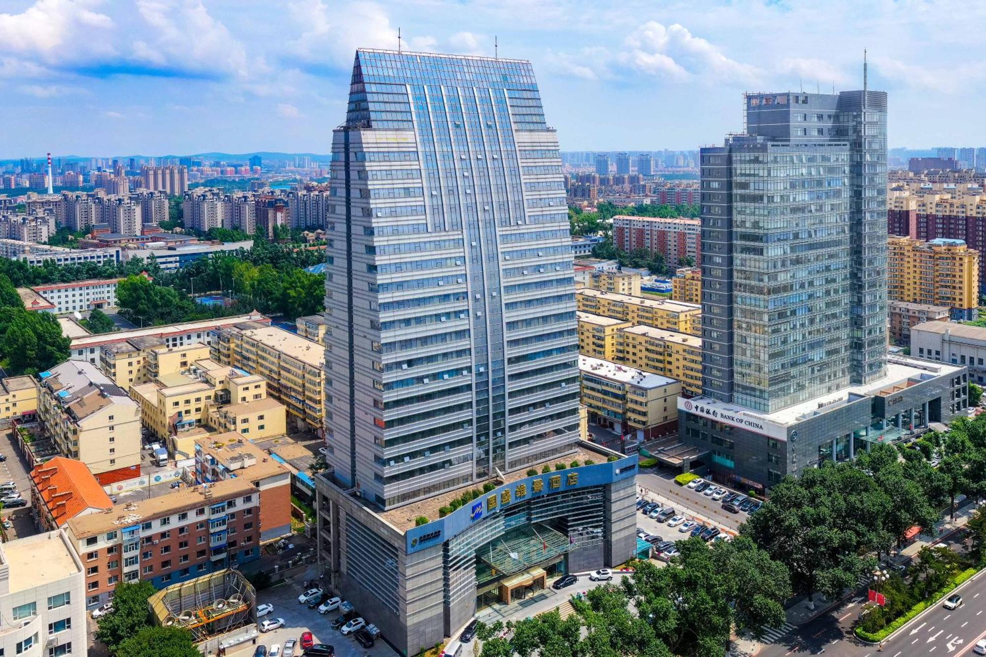 Metropark Changchun Guosheng Hotel Bagian luar foto